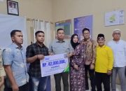 Dukung Kesejahteraan RT di Kota Jambi, Kemas Faried Serahkan Santunan Kematian dari BPJS Ketenagakerjaan