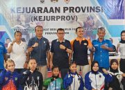 Ketua Umum Komite Olahraga Nasional Indonesia (Ketum KONI) Provinsi Jambi AKBP Mat Sanusi Membuka Kejuaraan Provinsi (Kejurprov) Angkat Besi Jambi di Gedung Pabbsi, Kota Baru